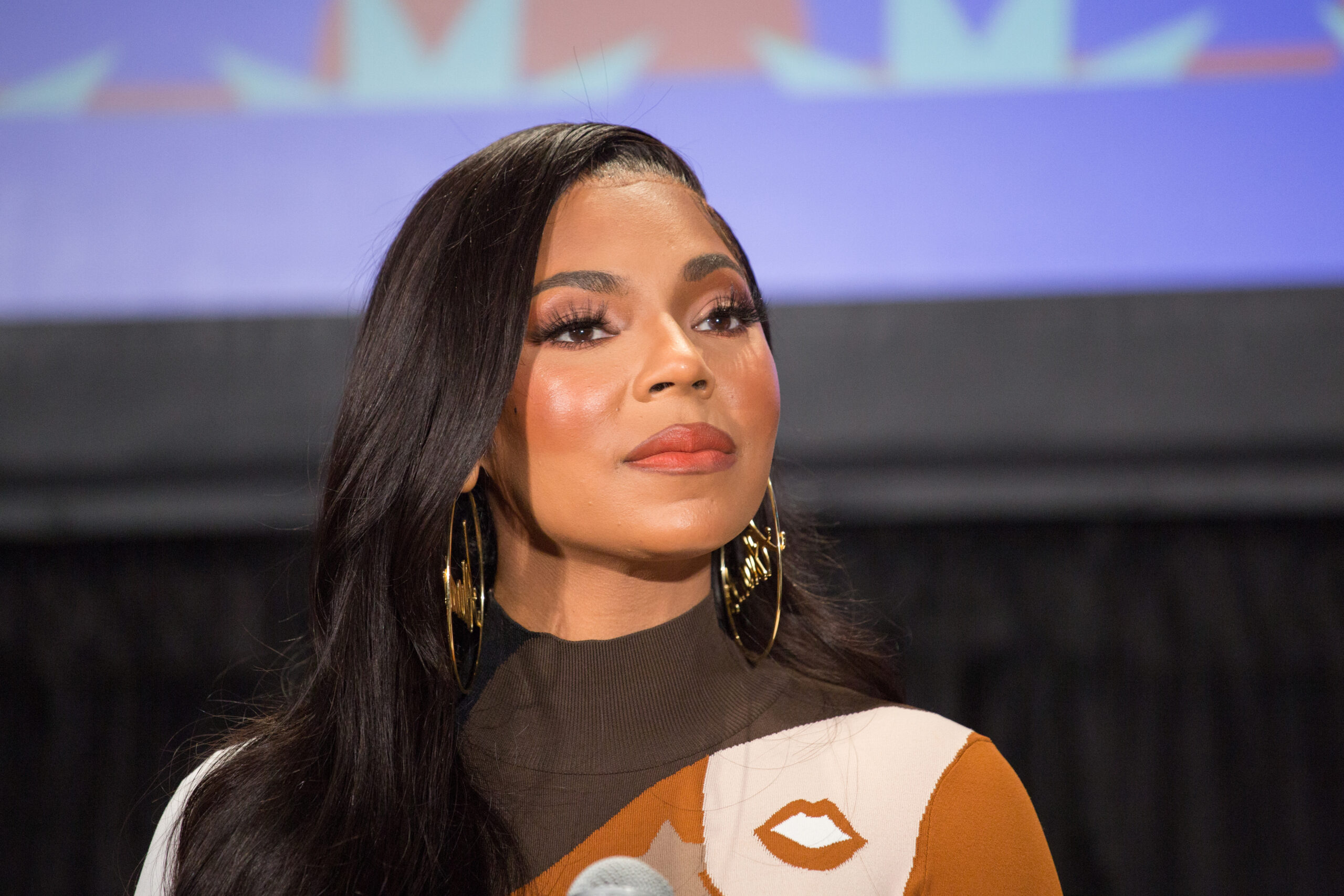 Ashanti Shuts Down the Internet In Skin-Tight Red Body Suit Dancing to Her 2002 Single ‘Foolish’ for Viral TikTok Challenge