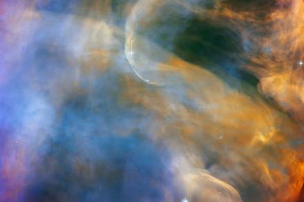 This colorful Hubble dreamscape is sculpted by newborn stars