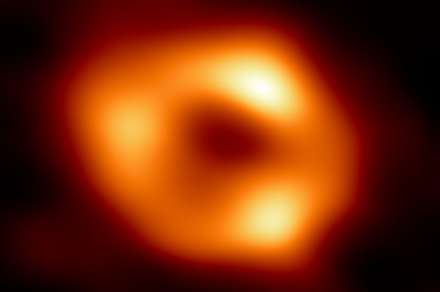 Bubble of gas zips around galaxy's supermassive black hole