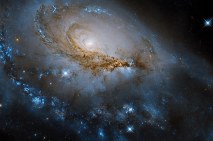 Hubble images a spiral galaxy with a brightly glowing heart