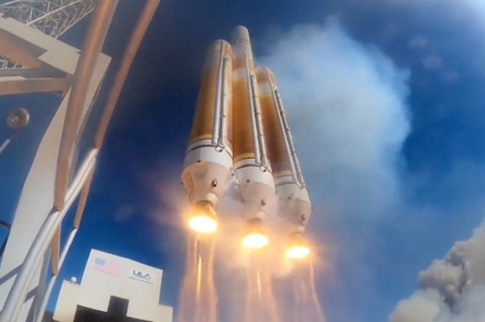 Awesome footage shows a triple-booster rocket launch
